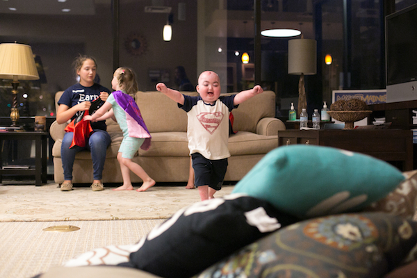 7-year-old Reef Carneson plays at a Dragonfly Foundation-organized activity center 