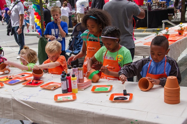 Cincy-Cinco children's activities include painting flowerpots as tokens of appreciation for mom