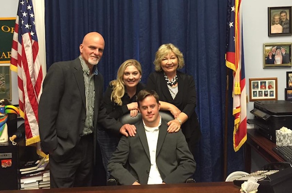 Cincinnati small business owner Terri Hogan (standing right) and employee Mike Ames (seated) visit Rep. Steve Chabot's office with family members