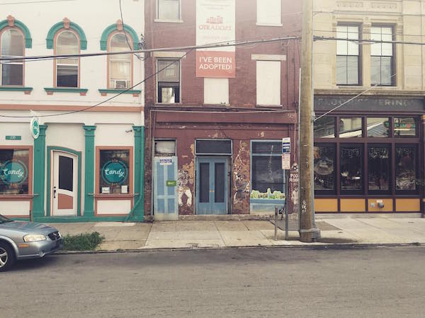 Gourmet cheese shop The Rhined will open at 1737 Elm St., which is the building in the middle. 