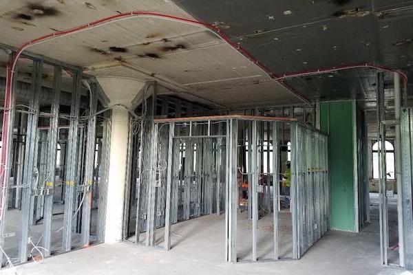 Framing of apartment units on the building's seventh floor. 