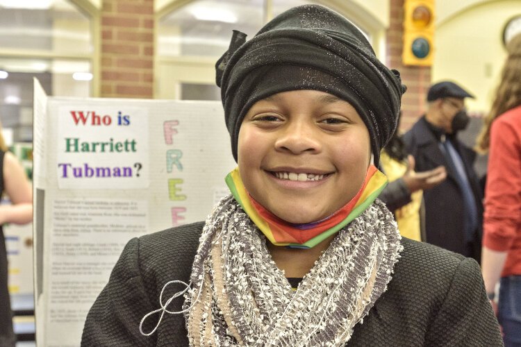 Madison Bradley manifests the spirit of Harriett Tubman at the Living Wax Museum event.