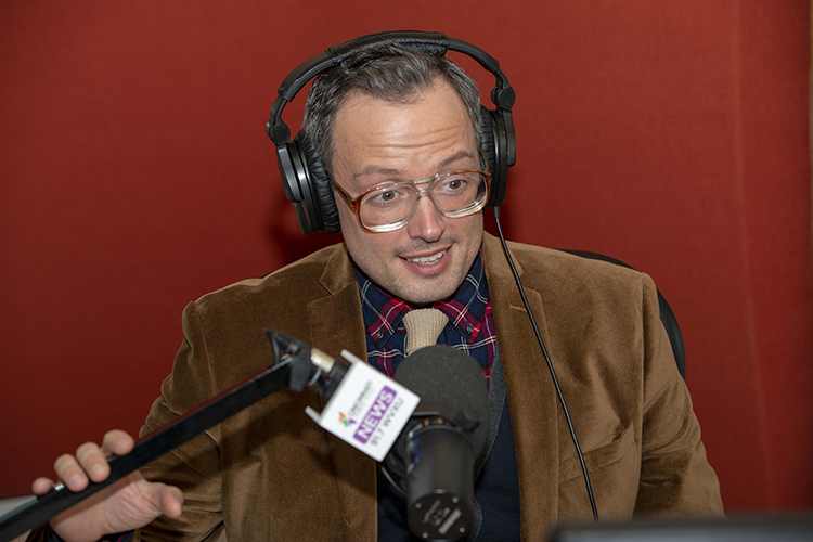 In his new habitat, Michael Monks behind the mic at WVXU.