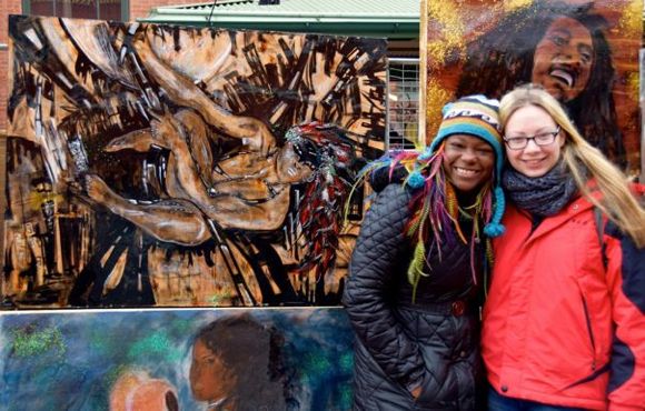 Quest Skinner (left) and her artwork in Washington, D.C.