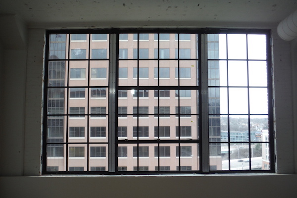 Windows on the upper floors were historically restored, but with paned glass. 