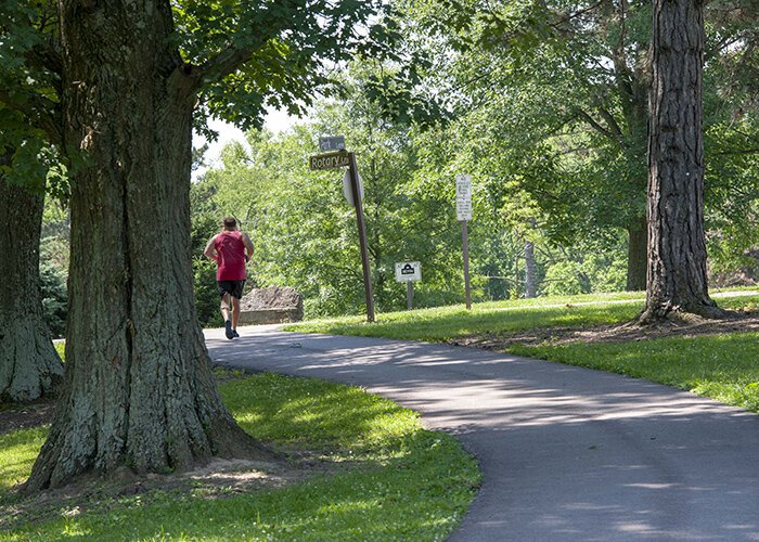 Runners frequent Devou Park's paved trails.