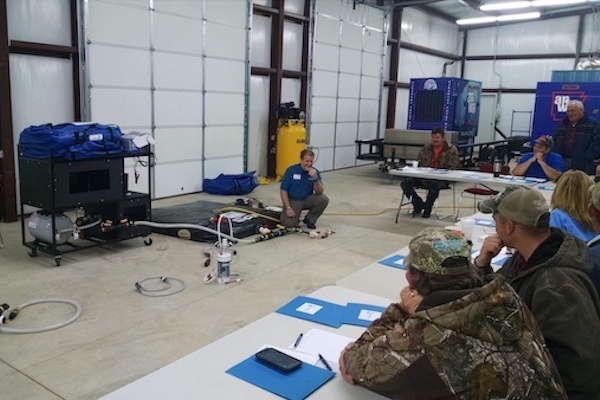 WaterStep leads a rural water training workshop, featuring its mini water chlorination plant.