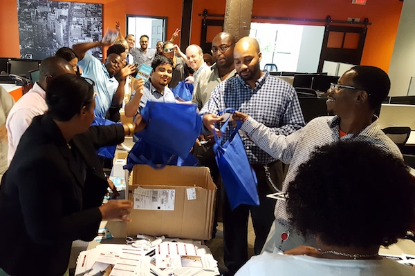 Team prepares swag bags for Paddlefest 2016