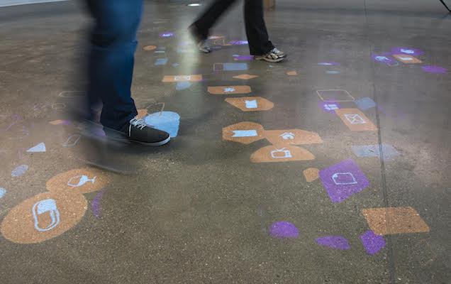 Visitors walk through 84.51's downtown headquarters.