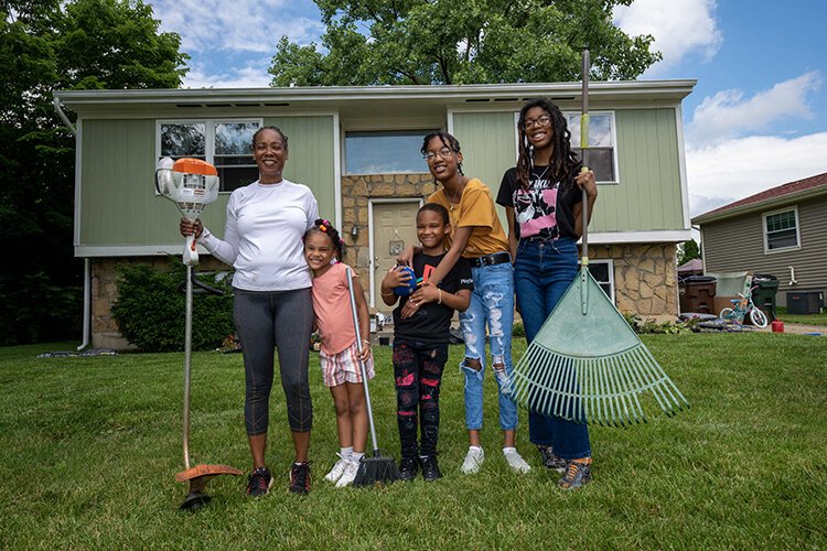 Jeannie Stinson and her family on communitywide clean-up day in Lincoln Heights.