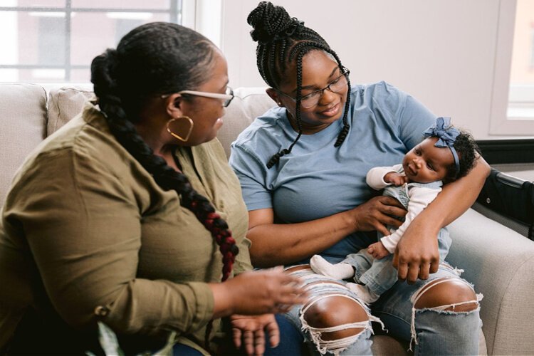 Community health workers and doulas can make home visits to support new moms.