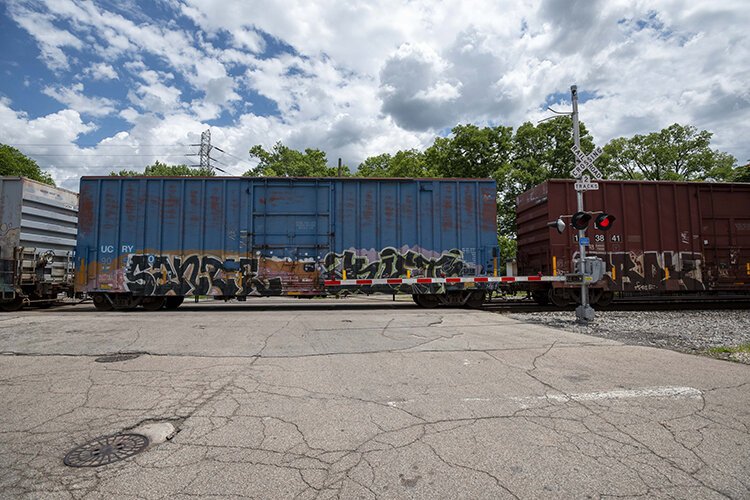 A stopped train blocks Dunn Street in Lockland. 