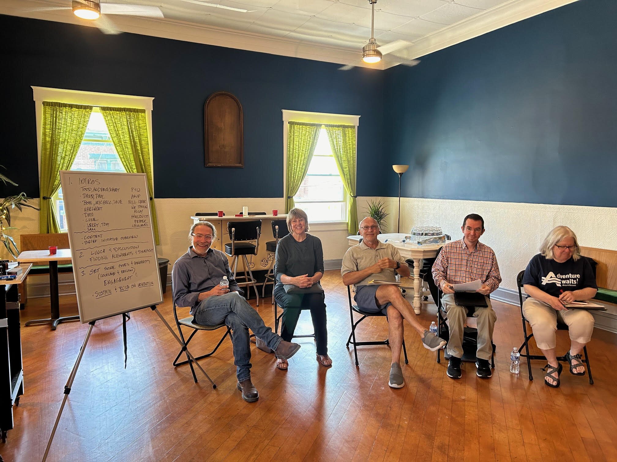 Architect Todd Snapp, Bob Ashbrock of Reading, Margaret Wienholts of Lockland, Dan Ferguson of Hamilton County Economic Development, Michele Gottschlich of Evendale, meet in the Dunn Street ballroom.