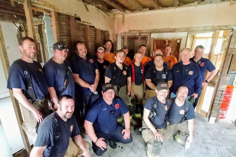 Some of the firefighters from Campbell County and Melbourne who turned out in Silver Grove.