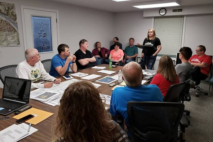 Felicia Huesman addresses the Silver Grove City Council about the house donation project.