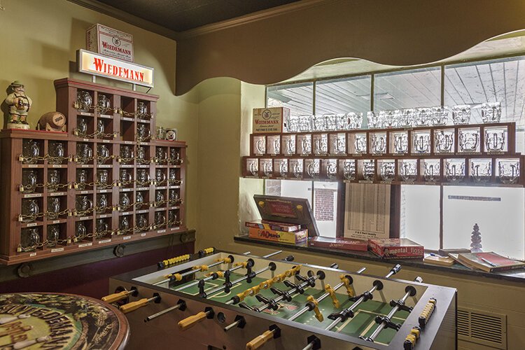 Jon Newberry says that Wiedemann fans from near and far enjoy the nostalgic collection of memorabilia in his establishment, which artfully harkens back to Wiedemann’s heyday, facilitating memories and stories of days gone by. 